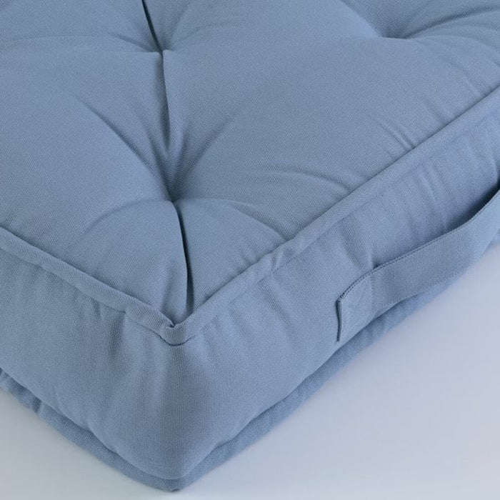 An IKEA floor cushion with a removable, washable cover for easy maintenance. 00415844, 90540221,10540220, 70540222