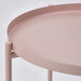 "The IKEA Tray Table in Pale Pink: a modern and elegant design with a smooth, pale pink surface and sleek legs."