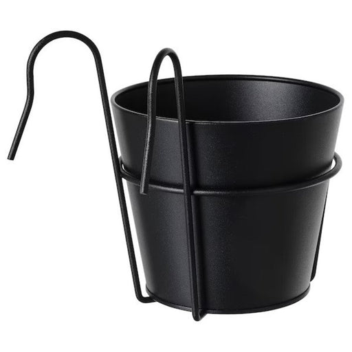A minimalist plant pot with a matte exterior.10505354 