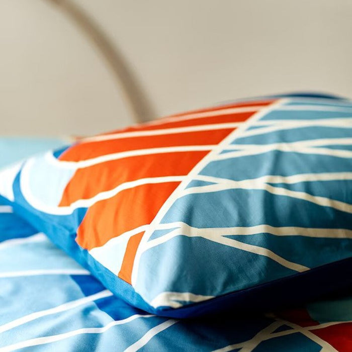  A close-up shot of IKEA's pillowcase in a soft lightblue  80491377