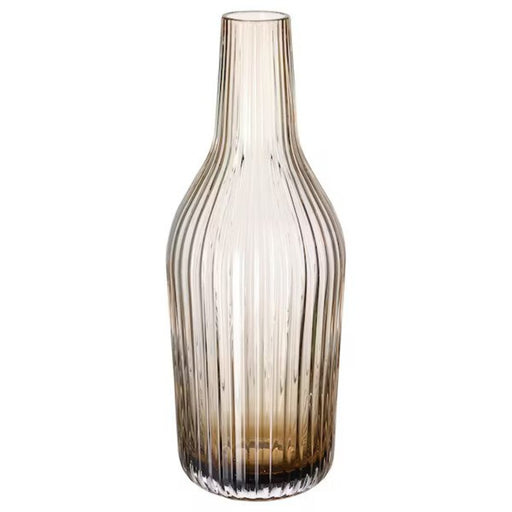 Digital Shoppy IKEA Carafe, decaration vase, online, price,  light brown,1 l  40513055, A 1-liter carafe made of clear glass, with a light brown cork stopper and filled with water, sitting on a white tablecloth. 