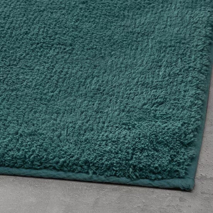Thick and luxurious bath mat from IKEA, with a plush texture that provides comfort and warmth to your feet after a shower or bath 90507995