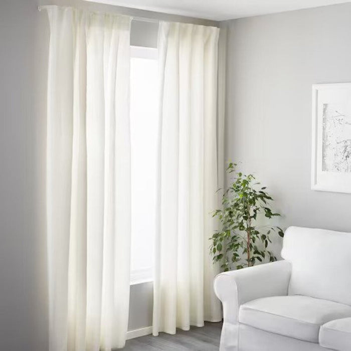 White IKEA single track rail holding curtains in living room 00492917