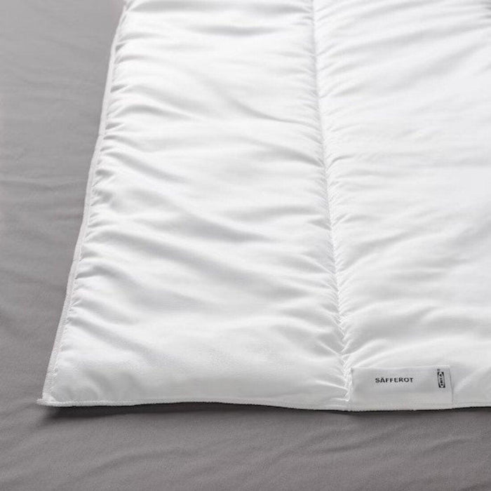 A closeup image of a white duvet 80511634, 70457072