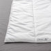 A closeup image of a white duvet 80511634, 70457072