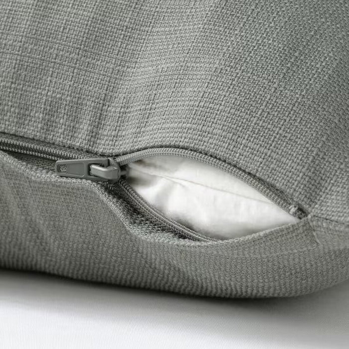 An image of an IKEA cushion cover with a grey-green color showcasing its soft texture and hidden zipper-90495266