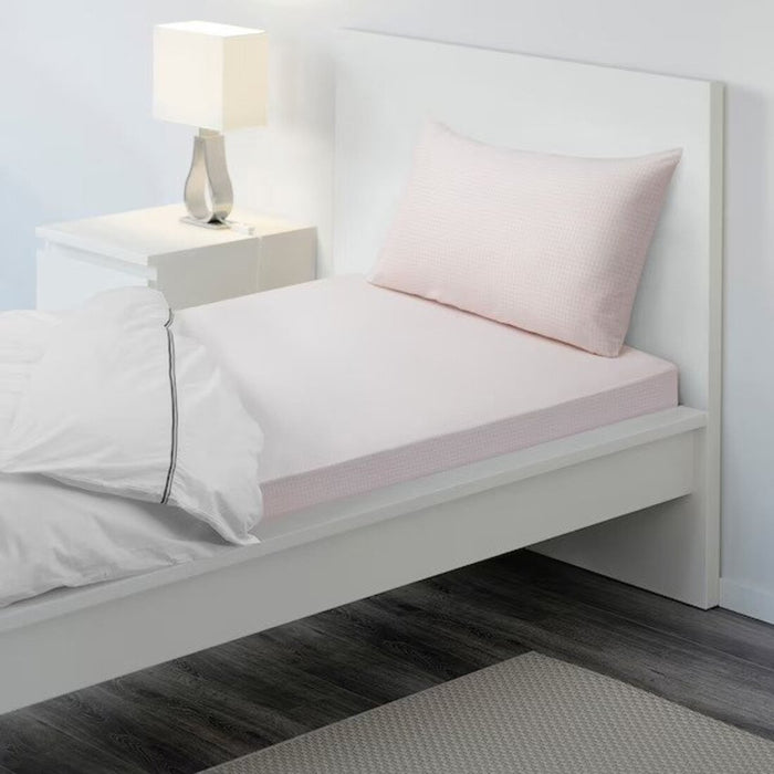 Pink cotton flat sheet and pillowcase from IKEA on a bed  40454796 