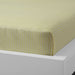 Yellow cotton flat sheet and pillowcase from IKEA draped on a bed  20454797