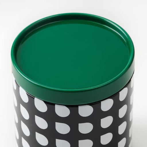 A close-up of the mixed pattern storage tins from IKEA. These tins are the perfect storage solution for household items.
