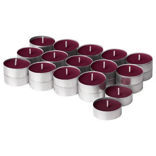 A group of scented tealight candles from IKEA in various colors and fragrances, perfect for adding a cozy touch to your home decor.