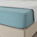 A fitted sheet in a bright and cheerful light blue color, made from 100% organic cotton and featuring a smooth and silky texturet 60501669