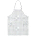 A  white polka designed apron with a vintage feel  20493096