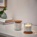 The beautiful and decorative touch added by IKEA's Scented Candle Lids, enhancing the overall ambiance of your home.30521980