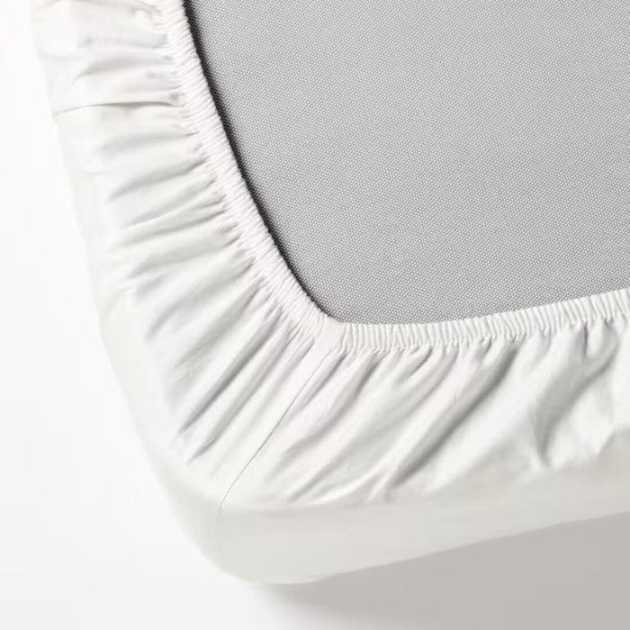 A closeup image of IKEA sheet fits over the corners of your mattress and stays in place thanks to the elastic edging  10357221
