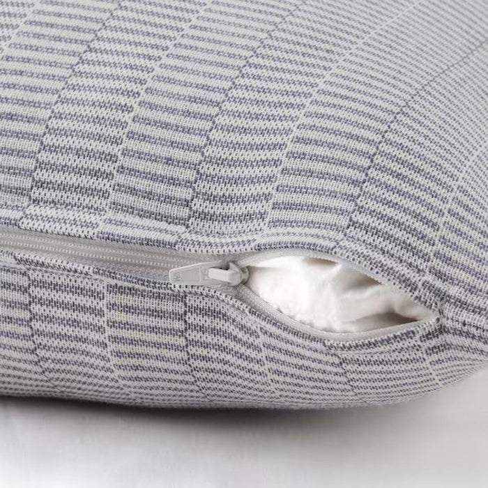 An image of an IKEA cushion cover  showcasing its soft texture and hidden zipper-90506953
