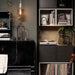 The versatile dark grey IKEA cabinet can be used to store clothes, accessories, or office supplies 70428918