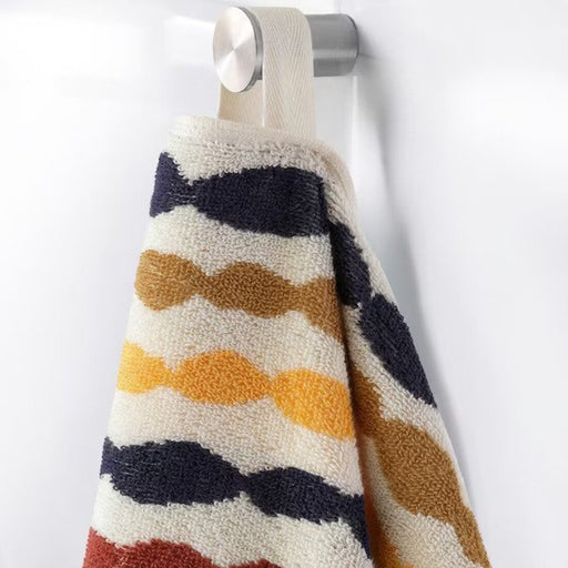 Multicolored bath towel from IKEA, 70x140 cm in size, featuring a rainbow of hues in a striped pattern.