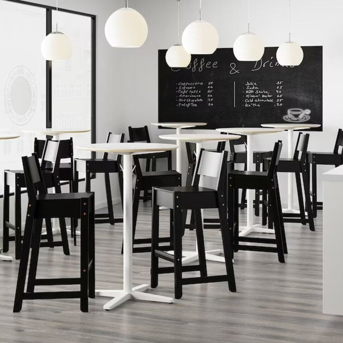A sleek and modern IKEA bar stool in a stylish kitchen.