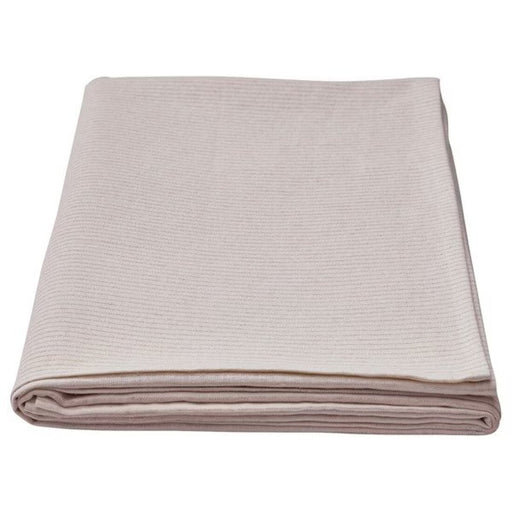A minimalist beige table runner with a subtle geometric pattern. 60526580