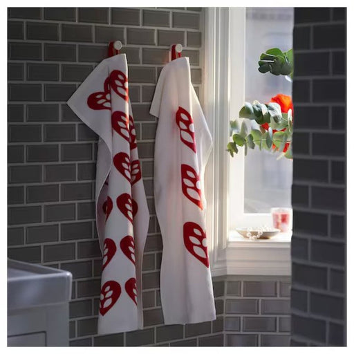 Soft and fluffy Ikea hand towel in classic white/red with a decorative heart pattern for charm 70530548