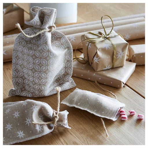 The convenient and reusable design of IKEA's gift bags, featuring sturdy handles and durable materials 10528789