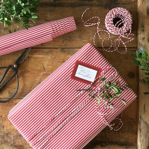 A wrapped gift featuring an IKEA sticker with the message  in beautiful letters, adding a personal touch to the gift  50524567