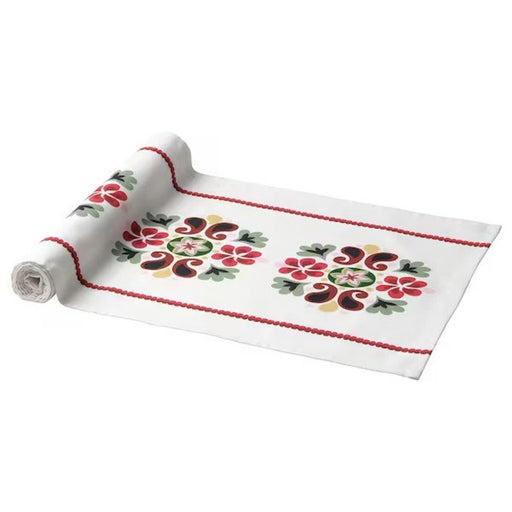 A tasteful table runner that adds a touch of refinement to your dining space. 40529669