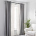 Simple, white curtains with no patterns, providing privacy without obstructing natural light.40171863