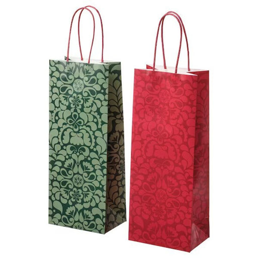An IKEA gift bag designed to hold a bottle, featuring a festive pattern in red and green 70528786