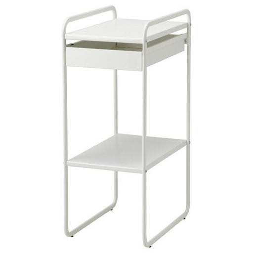 A white IKEA shelving unit with several compartments and baskets filled with various household items.
