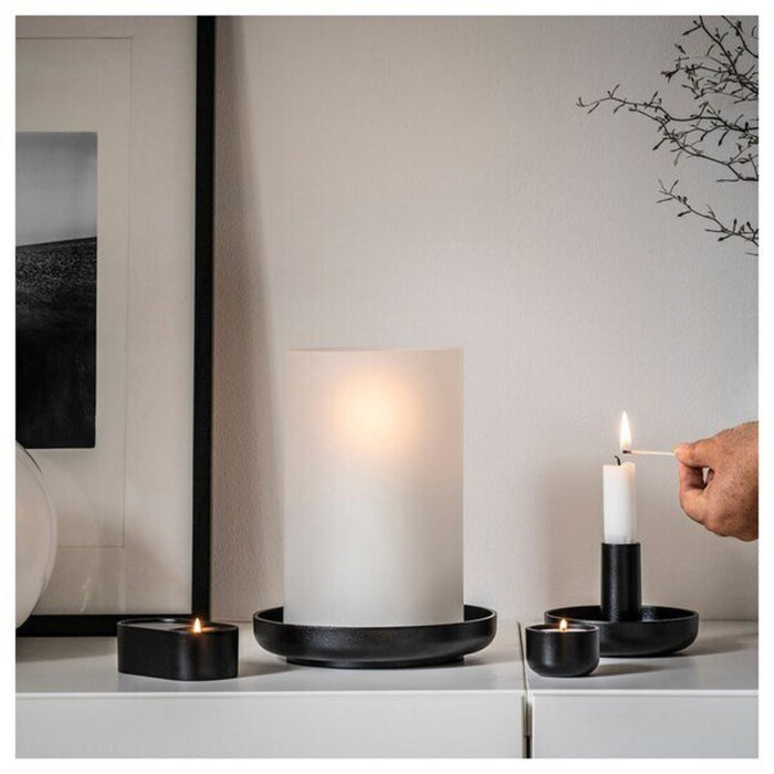 This charming tealight holder from IKEA will make a lovely addition to your home. Its delicate design and soft glow will create a warm and welcoming ambiance 70510625