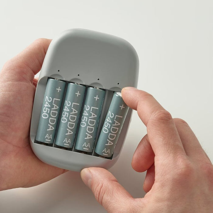The IKEA Battery Charger with four fully charged rechargeable AA batteries in place, ready to use 00506448
