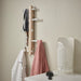 The Ikea vertical hook rack providing organized storage for clothes and accessories in a closet 20528345