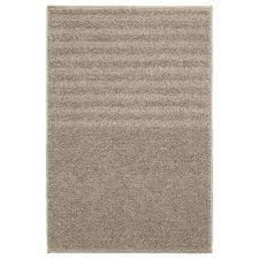 Beige bath mat from IKEA with plush texture and anti-slip backing for added safety and comfort 50447282