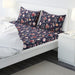 Multicolor cotton flat sheet and 2 pillowcase set from IKEA on a bed 20560571