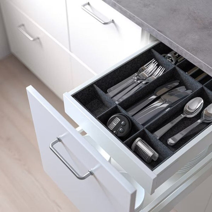 Digital Shoppy Alt text for customizable drawer compartments: "Customizable compartments in IKEA's grey adjustable drawer organizer, perfect for keeping your belongings organized and within reach. digital-shoppy-70549166