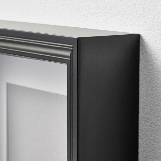 A classic black photo frame that brings a touch of elegance to any room 50479249