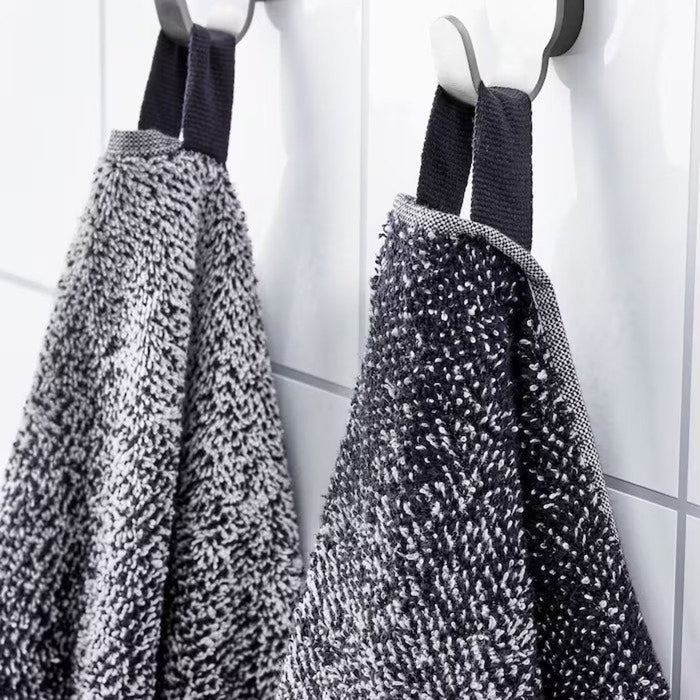 A close-up image of a folded White/Dark Blue hand towel with a textured pattern and  simple, classic hand towel, perfect for every bathroom 20494388