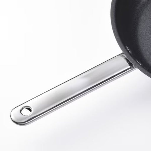 A close-up shot of the non-stick coating on the IKEA frying pan, highlighting its easy-to-clean surface.