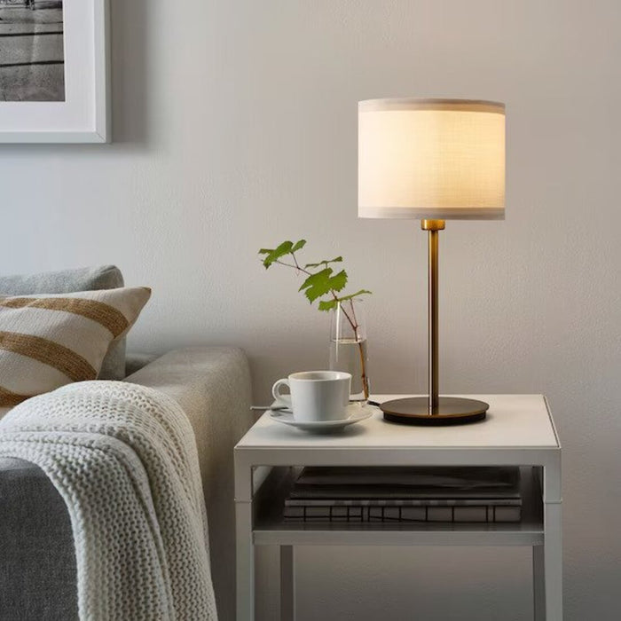 IKEA Table Lamp Base and Shade used in a living room, showcasing its ability to provide stylish and functional lighting  70405375 /60405955 -70405376 /00434668