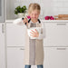Make cooking and baking a family activity with this cute and functional children's apron from IKEA, featuring an adjustable neck strap for a comfortable fit. 10479581