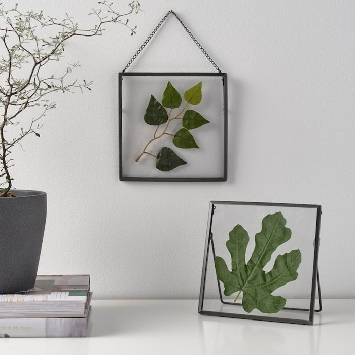 A collage photo frame that allows you to display multiple photos at once, creating a unique and personalized display 60443274