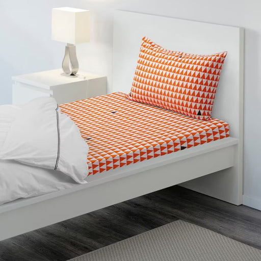 Orange cotton flat sheet and pillowcase from IKEA on a bed 50454786