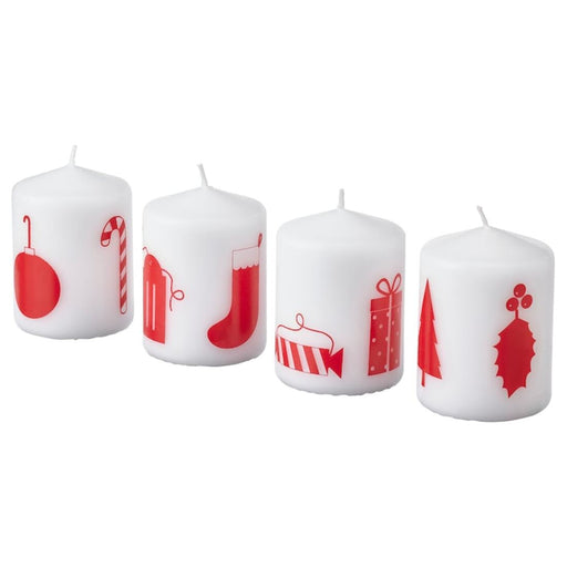 A set of white unscented block candles from IKEA, bringing a calming and peaceful ambiance to a room.