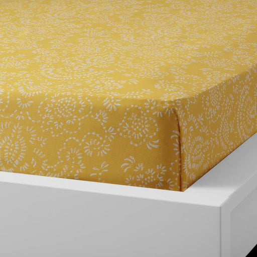 Yellow cotton flat sheet and 2 pillowcase set from IKEA draped on a bed  30418978