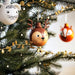  An IKEA bauble hanging in a tree adds a playful touch to any room 40498658