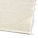 A set of cotton placemats with a rustic, handcrafted feel and a decorative embroidered border10246186