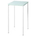 A light green IKEA table with two chairs, perfect for outdoor dining.