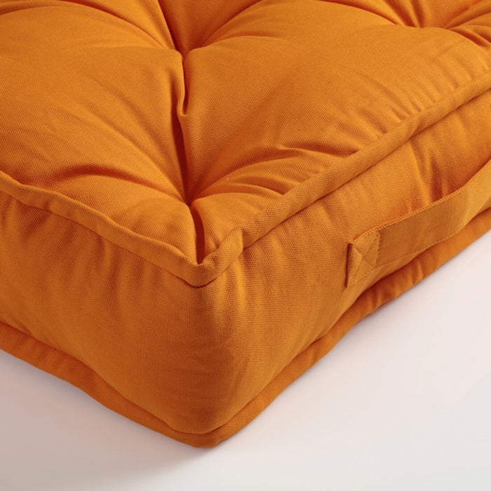 A cozy, plain yellow floor cushion from IKEA, perfect for a rustic interior. 00415844, 90540221,10540220, 70540222 