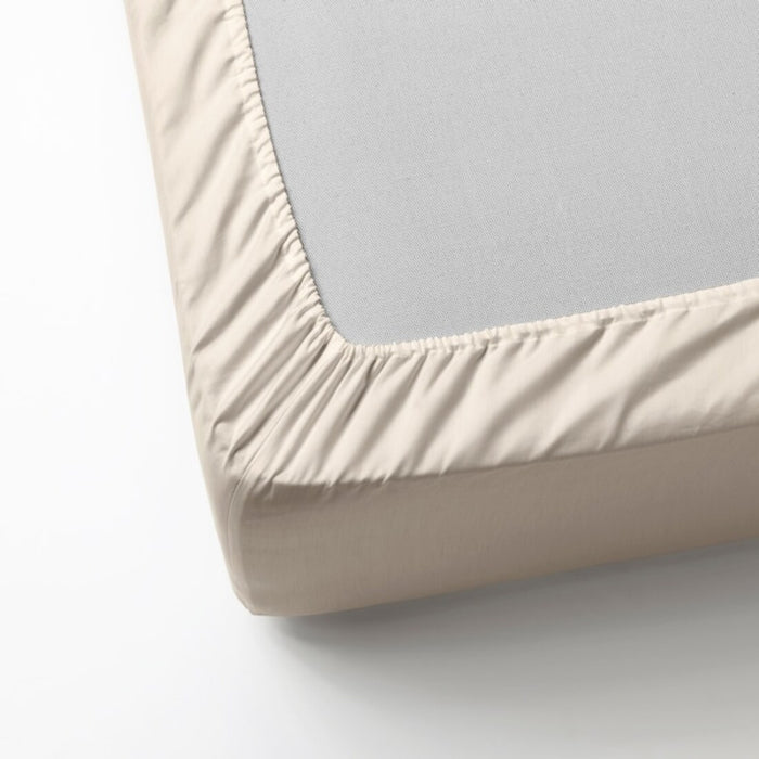 A close-up of an IKEA fitted sheet's elastic edges, showing its stretchiness and durability -50357224
